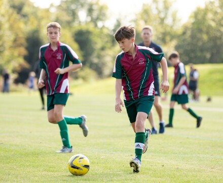 Boys playing football