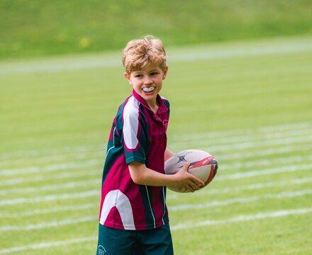 Boy with rugby ball